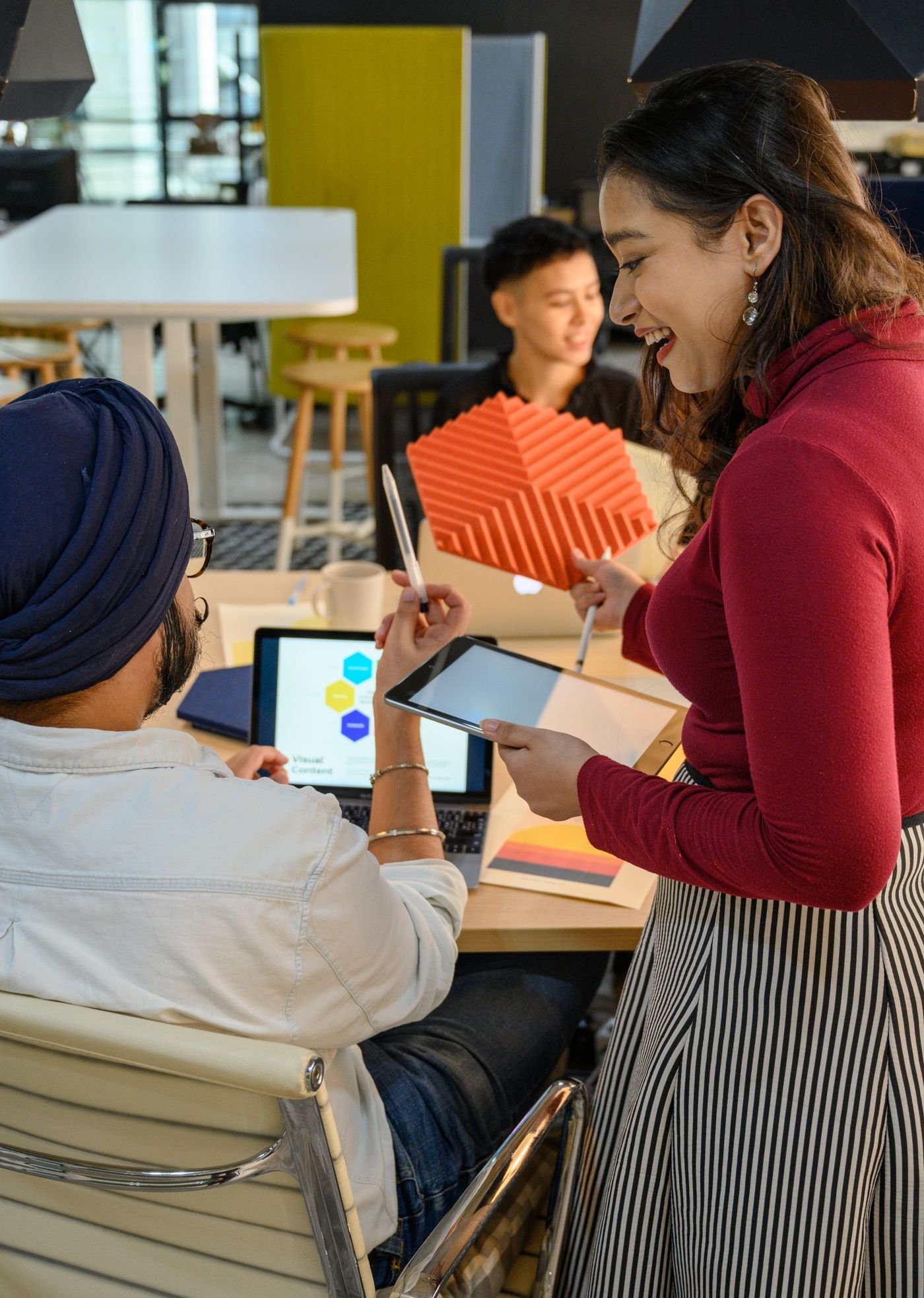 Colleagues working together on business technology
